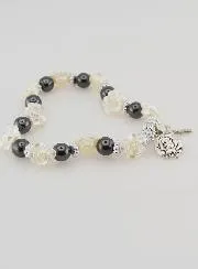 Armband Tientje Zwarte Kralen en Parelmoer Rozen