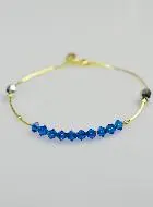 Armband Tientje Kristal Blauw en Goud
